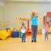 A child and a children's aerobics program: a set of exercises